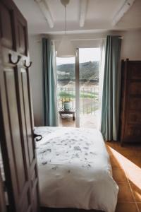 Posteľ alebo postele v izbe v ubytovaní Lake room Iznajar