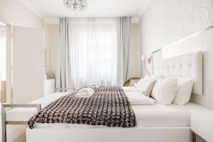 Posteľ alebo postele v izbe v ubytovaní De Luxe 1-bedroom, 2-bathroom Condo in the Center