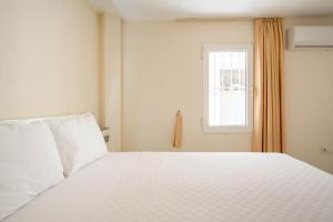 Katil atau katil-katil dalam bilik di BODRUM BURCU RESIDENCE, Magnificent Sea View, Cozy, Free Otopark, Free Wifi