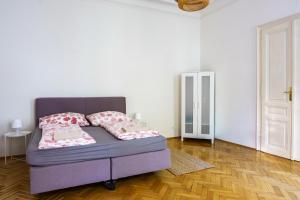 Postel nebo postele na pokoji v ubytování Vienna City Apartment University