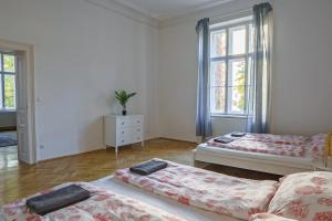 Postel nebo postele na pokoji v ubytování Vienna City Apartment University