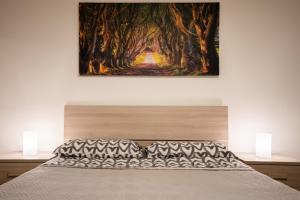 A bed or beds in a room at Loft in Centro - Sestola
