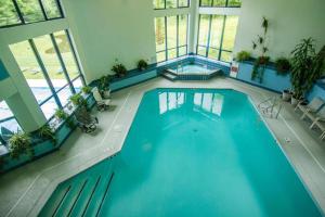 an overhead view of a swimming pool in a building at Sunrise Highlander L2 in Killington