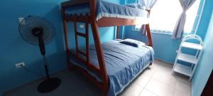 Postel nebo postele na pokoji v ubytování Villas Karen