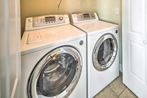 a washer and dryer in a laundry room at 1 Mi to Beach and Hot Tub Murrells Inlet Retreat! in Myrtle Beach