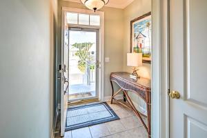 a home office with a desk and a window at 1 Mi to Beach and Hot Tub Murrells Inlet Retreat! in Myrtle Beach