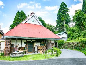 a house with a red roof on a road at Maibara - House - Vacation STAY 20710v in Nagahama