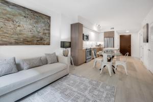 a living room with a couch and a table at Global Luxury Suites at Capitol Hill in Washington