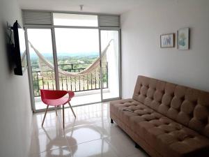 Zona de estar de Habitación , Paisaje Cafetero, a 10 min parque del café, baño privado apartamento compartido