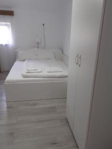 Postel nebo postele na pokoji v ubytování Casa Sommer