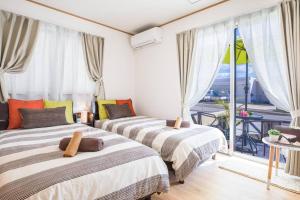 Ένα ή περισσότερα κρεβάτια σε δωμάτιο στο Laulea +62 φωτογραφίες