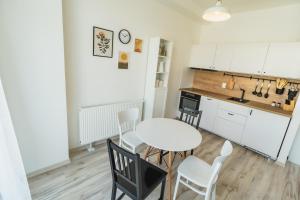 Kuchyňa alebo kuchynka v ubytovaní Apartmán Liptov 15 + 6 fotografií