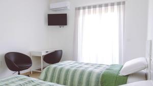 Postel nebo postele na pokoji v ubytování B&B Da Bea