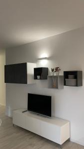 A television and/or entertainment centre at Casa Veronica nel cuore di Padova