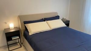 A bed or beds in a room at Casa Veronica nel cuore di Padova