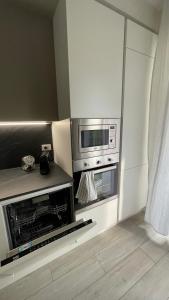 A kitchen or kitchenette at Casa Veronica nel cuore di Padova
