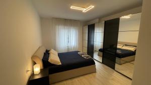 A bed or beds in a room at Casa Veronica nel cuore di Padova