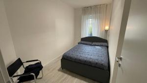A bed or beds in a room at Casa Veronica nel cuore di Padova