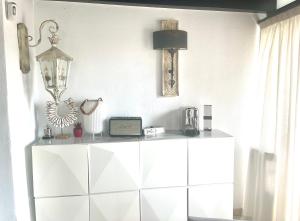 Kuchyň nebo kuchyňský kout v ubytování Luxury apartamento en río real