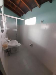 Koupelna v ubytování HOSTAL HELICONIAS