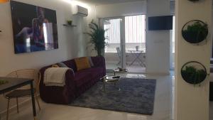 Apartamento Pepi Puerto (Adults Only)的电视和/或娱乐中心