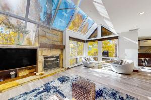 Televiisor ja/või meelelahutuskeskus majutusasutuses Unveil Vail