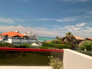 a view of the ocean from the balcony of a house at Milady Ocean View in Biarritz