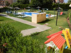 The swimming pool at or close to Family friendly patio and poolview