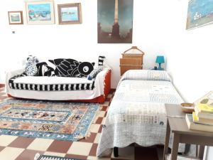 Łóżko lub łóżka w pokoju w obiekcie Bed & Breakfast Porta d'Oriente