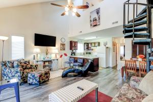 a living room with a couch and a table at Fairway Village - B6 in Myrtle Beach