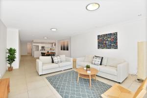 Posezení v ubytování Coast Apartments 7