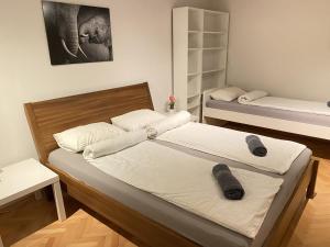 Postel nebo postele na pokoji v ubytování Villa pod Gradom
