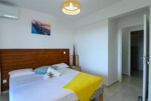 Postel nebo postele na pokoji v ubytování VILLA EDINA , Exceptionnel aux Trois ILETS,T3 vue incroyable sur FDF