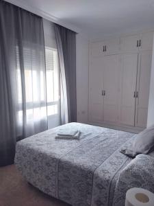 Cama o camas de una habitación en Apartamento Las Brisas