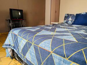 Cama o camas de una habitación en Izinjiki Namacusi Guest House
