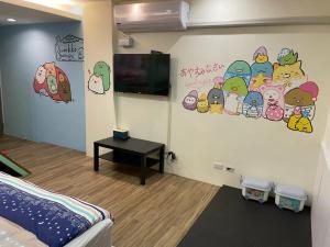 TV a/nebo společenská místnost v ubytování Star Moon Forest Inn