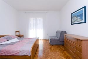Posteľ alebo postele v izbe v ubytovaní Apartments Slavica