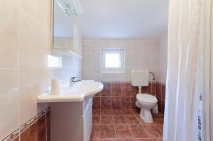 Kúpeľňa v ubytovaní Apartments Slavica