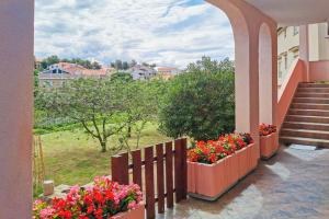 Vonkajšia záhrada v ubytovaní Apartments Slavica