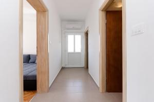 Posteľ alebo postele v izbe v ubytovaní Apartments Slavica