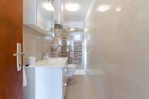 Kúpeľňa v ubytovaní Apartments Slavica