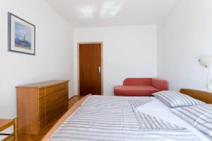 Posteľ alebo postele v izbe v ubytovaní Apartments Slavica