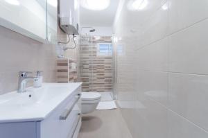 Kúpeľňa v ubytovaní Apartments Slavica + 37 fotografií