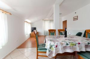 Posedenie v ubytovaní Apartments Slavica