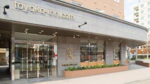 a toryko incolis store on a city street at Toyoko Inn Hokkaido Okhotsk Abashiri Ekimae in Abashiri