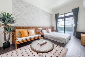 Voodi või voodid majutusasutuse Choco Style Inn toas