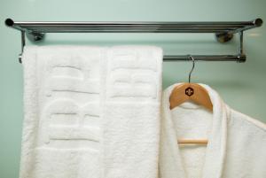 a towel hanging on the side of a towel rack at B P International in Hong Kong