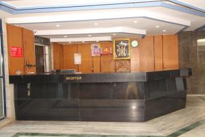 a lobby of a hotel with a reception desk at Hotel great punjab in Aurangabad