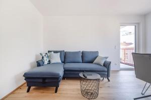 Posedenie v ubytovaní Grüne und zentrale Ruhelage im Neubau mit Balkon
