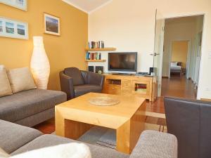 Μια τηλεόραση ή/και κέντρο ψυχαγωγίας στο Villa Sommerwind - WG 01 mit Sauna, Kamin und Terrasse +24 φωτογραφίες